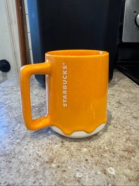 Starbucks Bright Orange Ceramic Mug with White Drip Accent